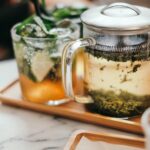 “집에서 실천하는 대체요법, 건강 관리의 새로운 바람” clear glass mug on tray