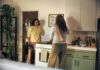 내 마음 챙기기, 일상에서 실천하는 정신건강 루틴 Two women talking in a kitchen while cooking